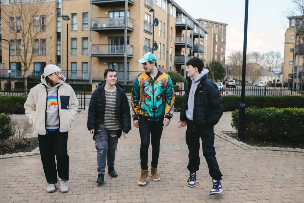 Group of young people walking towards camera