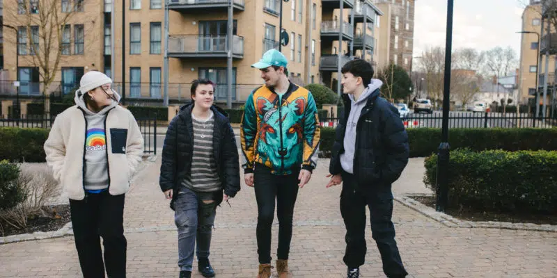 Group of young people walking towards camera
