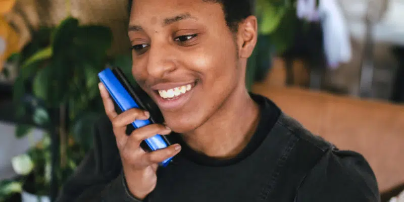 Rachele smiling on the phone