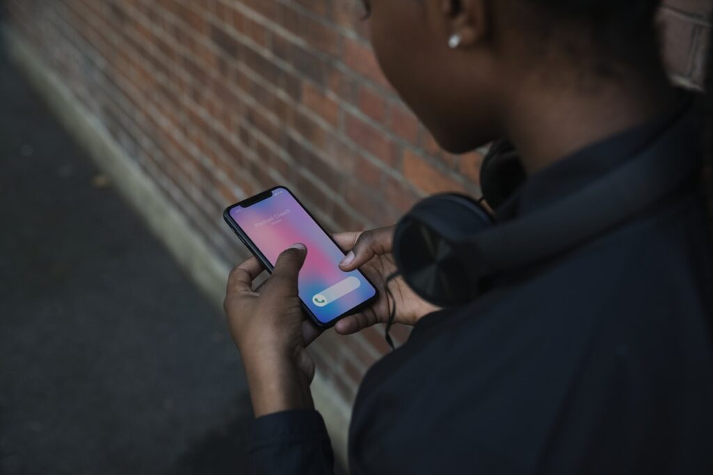 person looking at a phone screen
